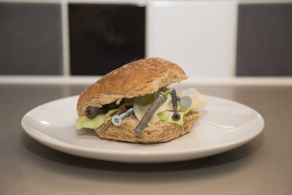 Metal in sandwich
