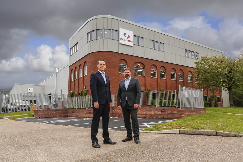 Simon Ayling and Adrian Coleman outside the new extended Bunting-Redditch manufacturing facility